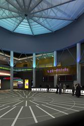 The lobby has a circular design with a skylight above.  On the right is the ticket counter. - , Utah